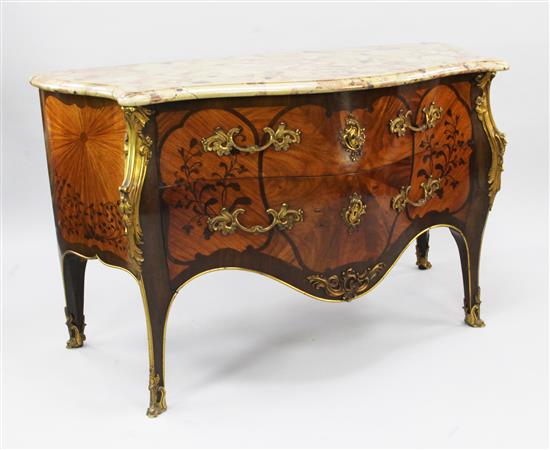 A Louis XV style marble topped bombe shaped commode, W.4ft 9.5in.